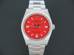Rolex Oyster Perpetual 126000 NEW Coral Red Dial