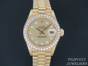 Rolex  Datejust Yellow Gold Diamond bezel & Champagne Diamond Dial 69138