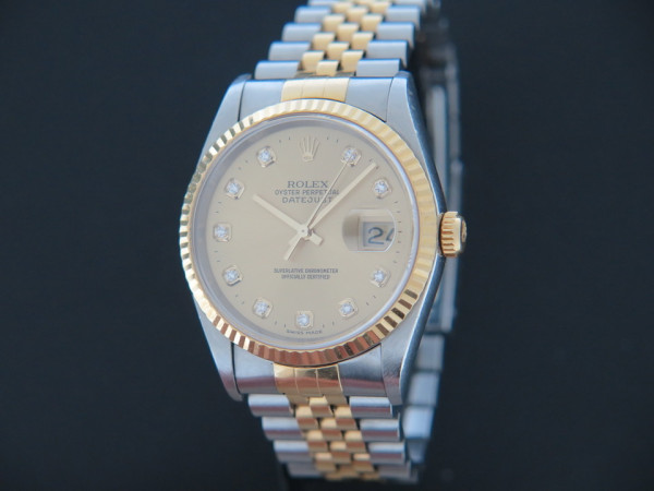 Rolex - Datejust Gold/Steel 16233 Champagne Diamond Dial