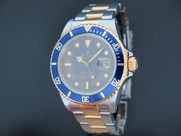 Rolex - Submariner Date Gold/Steel Blue Tropical Dial 16803