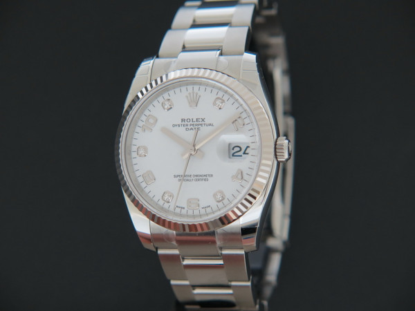 Rolex - Date White Diamond Dial NEW 115234