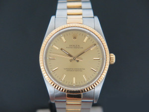 Rolex Oyster Perpetual Gold/Steel 14233 Champagne Dial