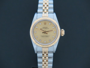 Rolex Oyster Perpetual Lady Champagne Diamond Dial 67193