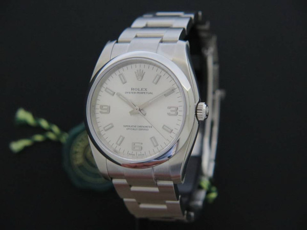 Rolex - Oyster Perpetual Silver Dial 3 6 9 NEW