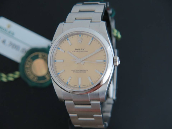 Rolex - Oyster Perpetual Champagne-Colour Dial NEW 114200  