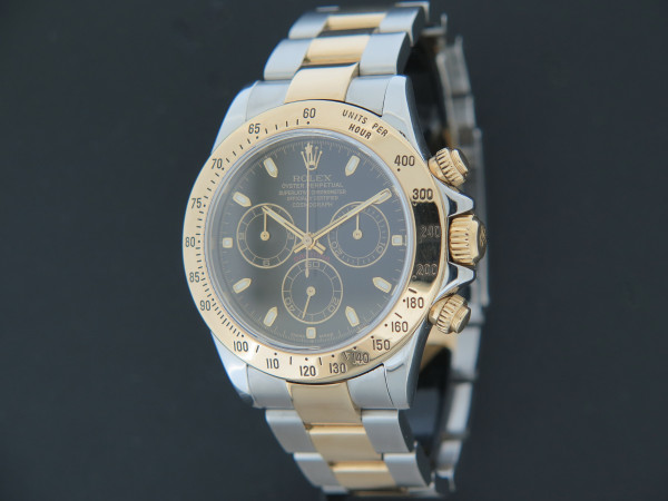 Rolex - Daytona Gold/Steel Black Dial 116523 