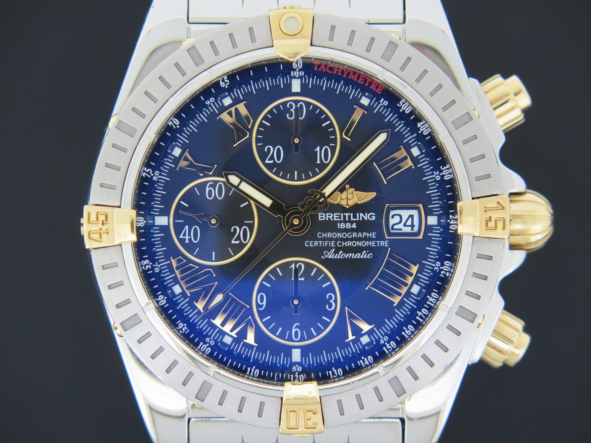 Breitling Chronomat Evolution Gold Steel Black Dial B13356 Uhren Filipucci Juwelers