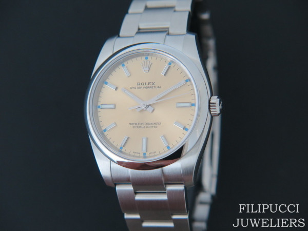Rolex - Oyster Perpetual Champagne-Colour Dial NEW 114200    