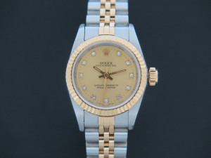 Rolex Oyster Perpetual Lady Champagne Diamond Dial 67193