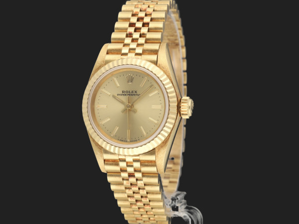 Rolex - Oyster Perpetual 26 Yellow Gold Champagne Dial 67198