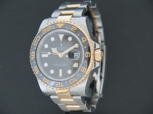 Rolex - GMT Master II Gold/Steel 116713LN