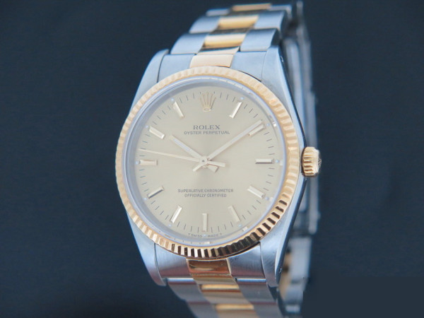 Rolex - Oyster Perpetual Gold/Steel 14233 Champagne Dial 
