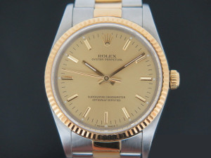 Rolex Oyster Perpetual Gold/Steel 14233 Champagne Dial 