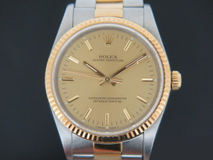 Rolex Oyster Perpetual Gold/Steel 14233 Champagne Dial